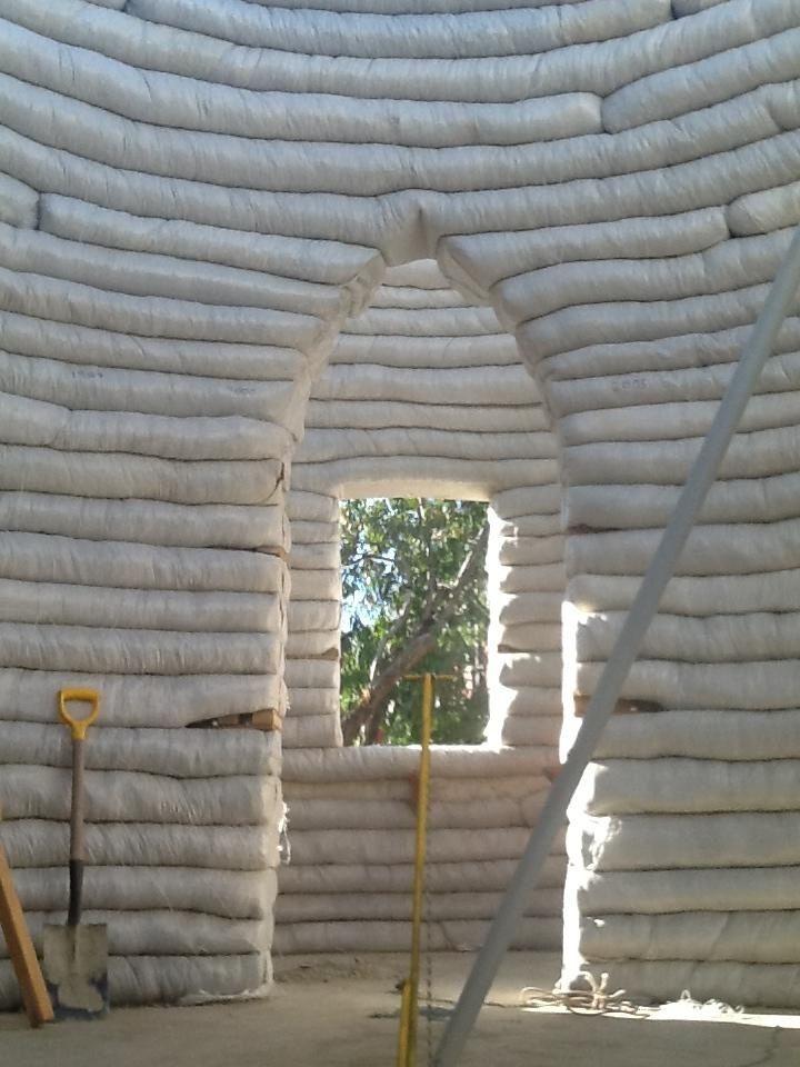 Coiling the earthbags